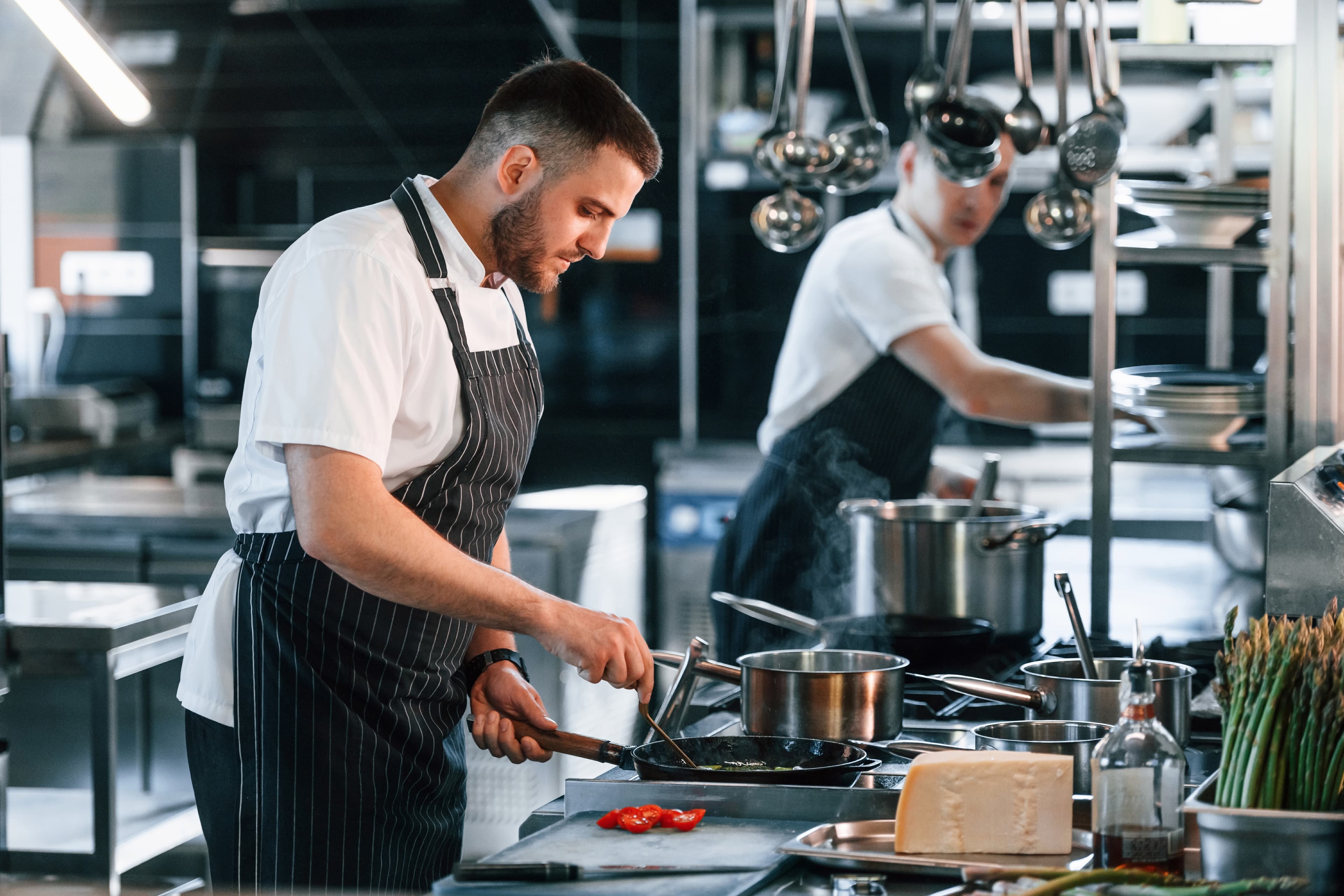 Background image of gig workers cooking